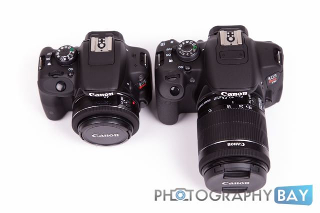 Canon Rebel SL1 with 40mm f/2.8 Lens next to the Rebel T5i and 18-135mm IS Lens